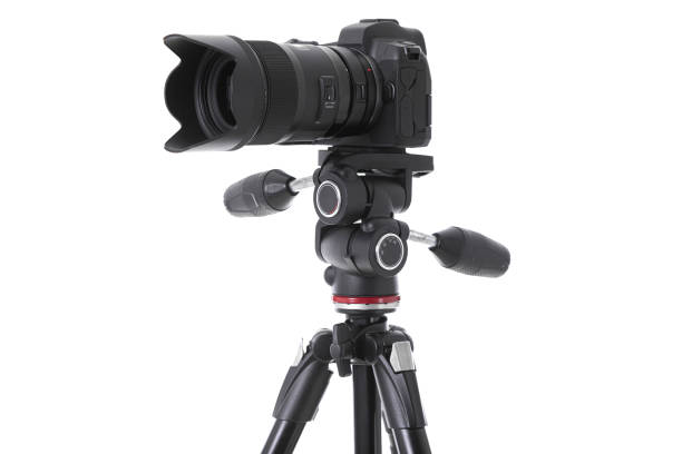 istock Side-view of professional camera with big camera glass isolated 1177656338
