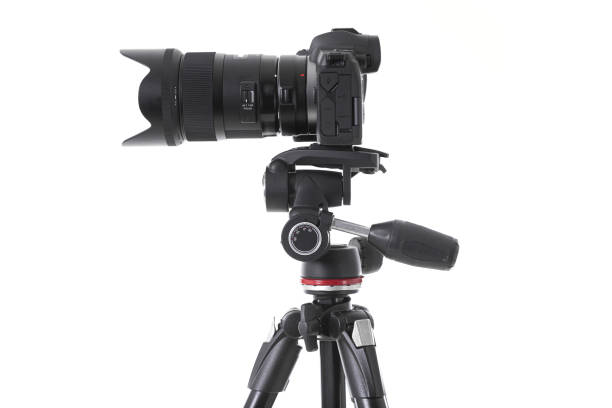 istock Side-view of professional camera device with big camera glass isolated 1177656341