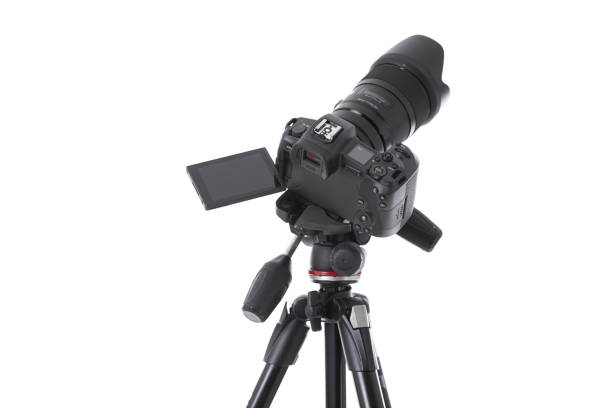 istock High angle view on massive black still-shot camera on trepied isolated 1177656349