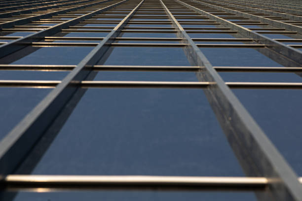 Bottom view of mirrorlike office building wall