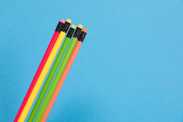 istock Five colorful pencils with erasers are lying on azure background isolated 1177657173