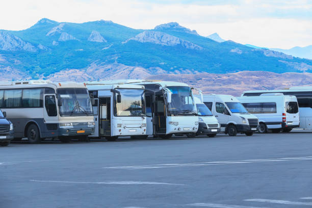 istock tourist buses on parking 1177660272