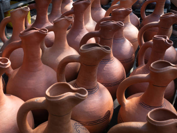 istock Many  earthenware jugs for wine are sold. Georgia 1177661654