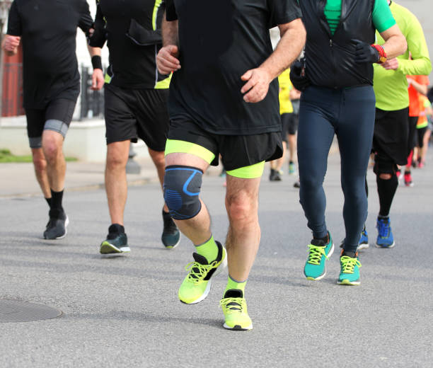 istock athletes participating in a road marathon 1177663945