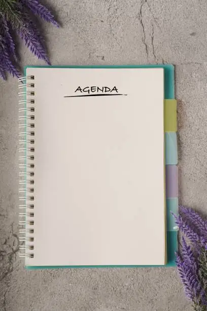 Agenda wordings on a blank notebook