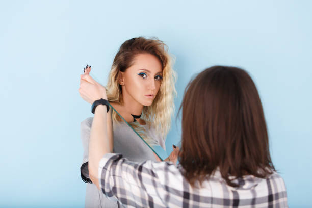 istock Woman looking at her self reflected in a mirror 1177669997