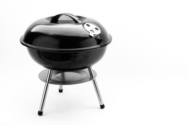 istock Kettle barbecue grill with cover isolated on white 1177670318
