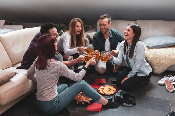 istock Happy group of friends drinking beer 1177673947