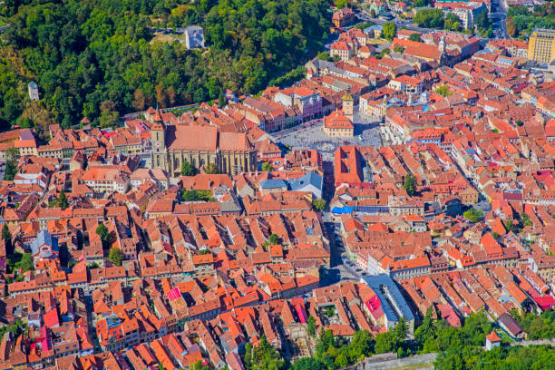 Aerial view of medieval city of Brasov, Romania; Black Church and Council Square