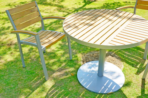 istock Wooden folding table and chair in garden 1177687398