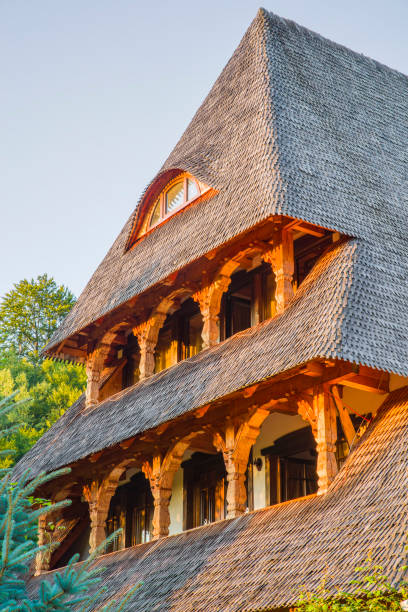 Traditional romanian architecture  in Maramures county, wwoden house at sunset.