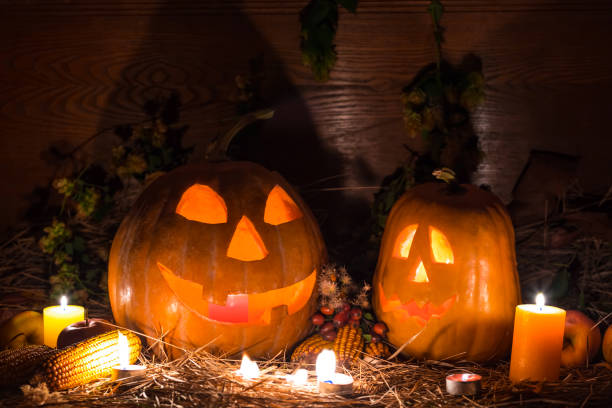 istock halloween night scene, jack o lantern pumpkin with candle 1177689326
