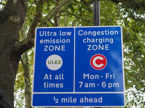 ULEZ (Ultra low emission zone at all times) and C (Congestion charging zone) signs in London, UK