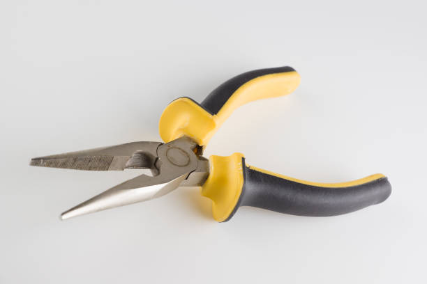 pliers with a long working part and dielectric handles are isolated on a white background