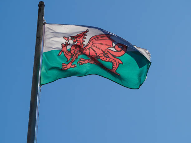 istock Welsh Flag of Wales over blue sky 1177694104