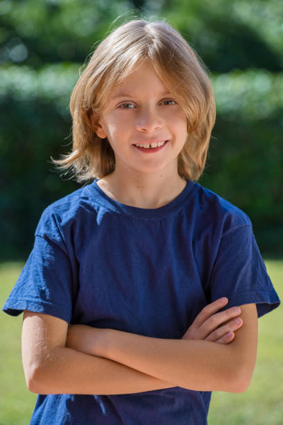 istock Vertical Portrait of a young boy smiling 1177698916