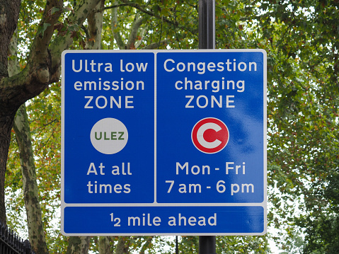 ULEZ (Ultra low emission zone at all times) and C (Congestion charging zone) signs in London, UK