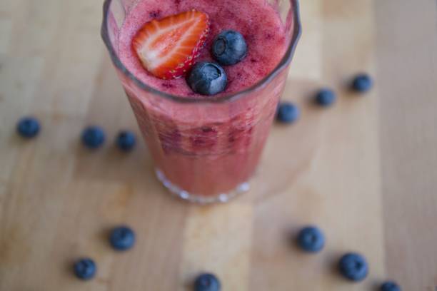 istock Healthy strawberry and blueberry smoothie 1177702549
