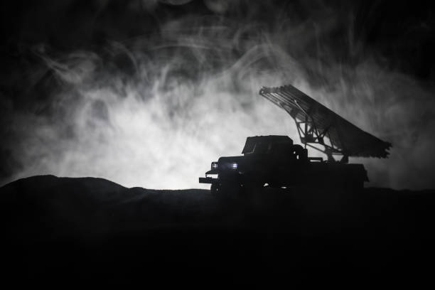 istock Rocket launch with fire clouds. Battle scene with rocket Missiles with Warhead Aimed at Gloomy Sky at night. Soviet rocket launcher on War Background. 1177712543
