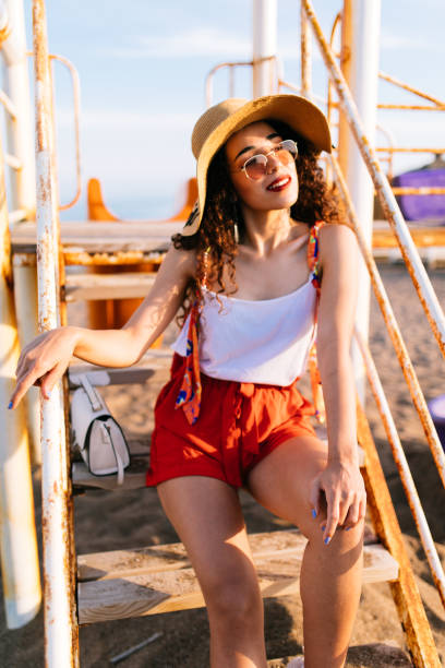 istock Young woman enjoying sunset 1177716009