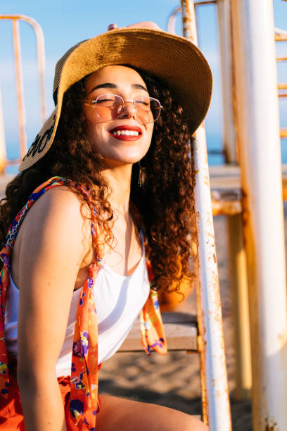 istock Young woman enjoying sunset 1177716058
