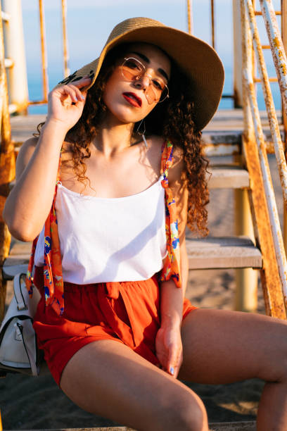 istock Young woman enjoying sunset 1177716138