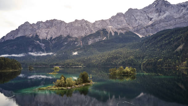 istock Cloudy german lake eibsee zugspitze 1177716392