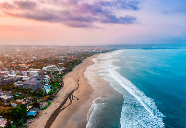 Kuta Beach at Sunrise, Bali Indonesia. Kuta Beach, Bali Indonesia at sunrise. kuta beach stock pictures, royalty-free photos & images