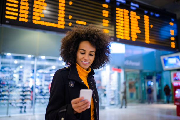 istock Young woman at the train station 1177724567