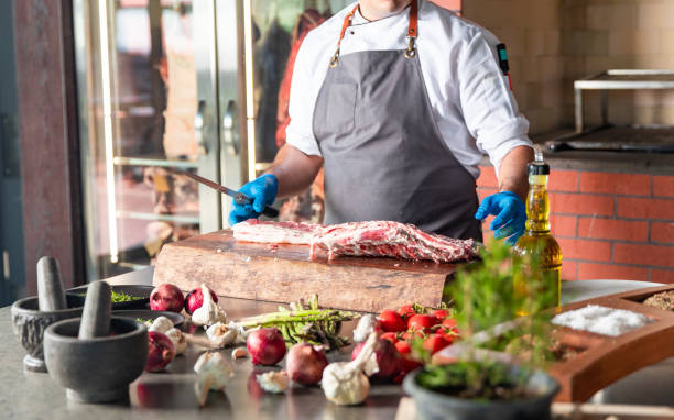 istock Chief preparing lamb rib meat for delicious dinner meal 1177727871