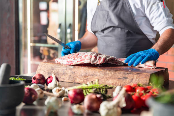istock Chief preparing lamb rib meat for delicious dinner meal 1177729202