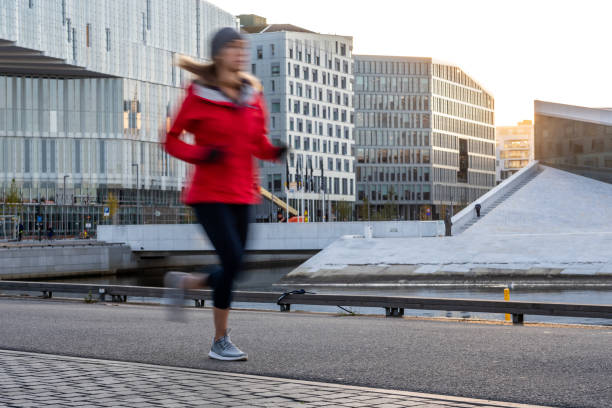 istock Woman exercising in early morning. 1177731264