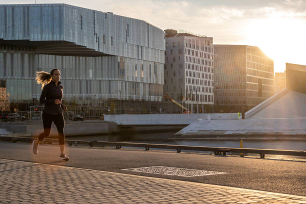 istock Woman exercising in early morning. 1177731287
