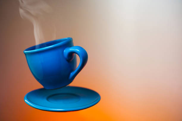 istock Blue cup of espresso soaring in the air 1177732643