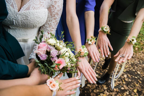 istock Flower bracelets with roses and silk ribbons. 1177739558