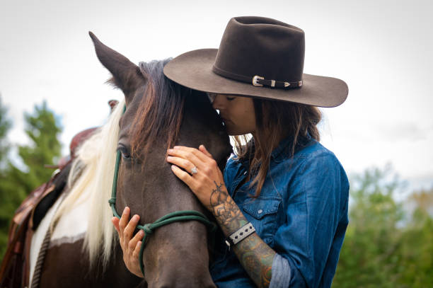 Female rancher working with her horse