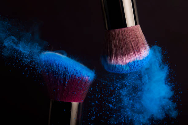 istock Cosmetics brush and colorful makeup powder 1177769061