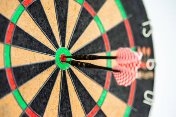 istock Success hitting target aim goal achievement concept background - three darts in bull's eye close up. red three darts arrows in the target center business goal concept 1177776949