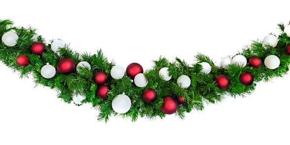 Christmas garland with red silver baubles, isolated on white.