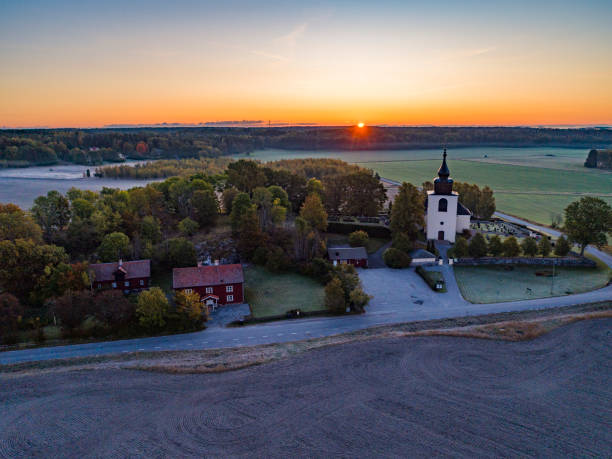 istock Aerial view over a church in a rural landscape 1177779659
