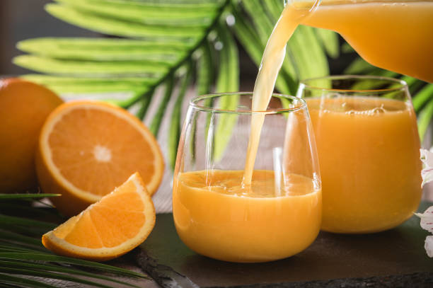 istock Fresh orange juice with fresh oranges 1177790033