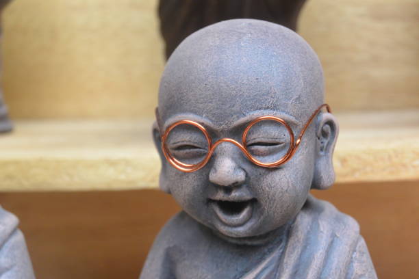Close up portrait of a laughing Buddha statue