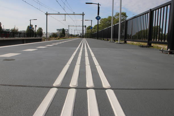 istock Guiding lines on platform for blind people to feel the save Direction on station Lansingerland Zoetermeer in the Netherlands 1177793157