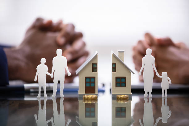 Wife And Husband Splitting Children And House Wife And Husband Splitting Children And House During Divorce Process battle stock pictures, royalty-free photos & images