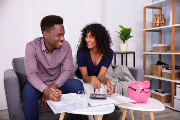 istock Young Couple Calculating Invoice 1177794817