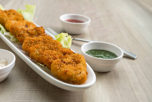 istock Heart shape cutlets with sauce and green chutney 1177795946