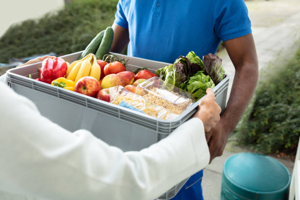 istock Grocery Delivery Courier At Home 1177797029