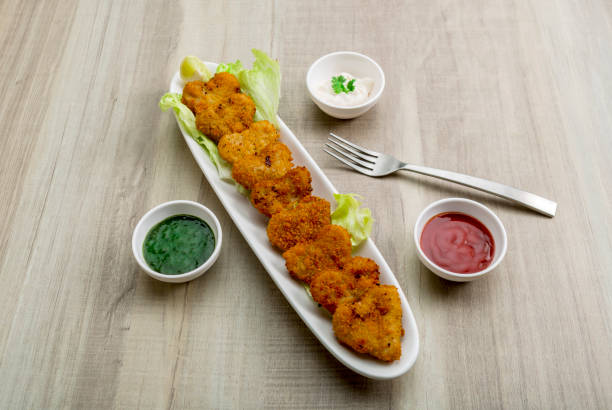 istock Heart shape cutlets with sauce and green chutney 1177797279