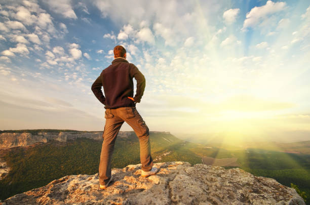 istock Man on top of mountain. 1177797995