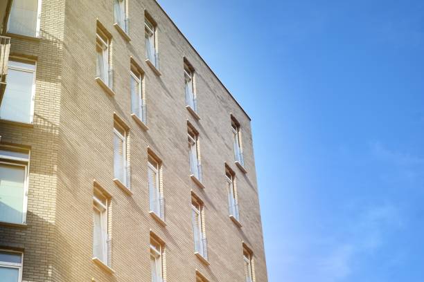 istock Facade of a modern apartment building. Glass surface with sunlight. 1177800368